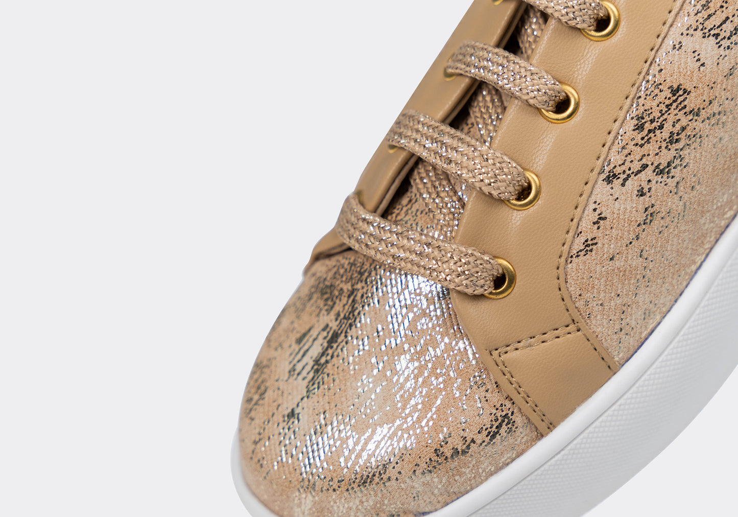 Liv – Striking gold abstract foil print sneaker with beige accents