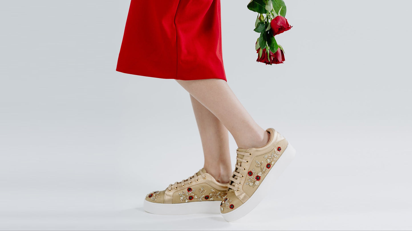 Blaze – Gold tissue fabric with gold and red flower embroidery