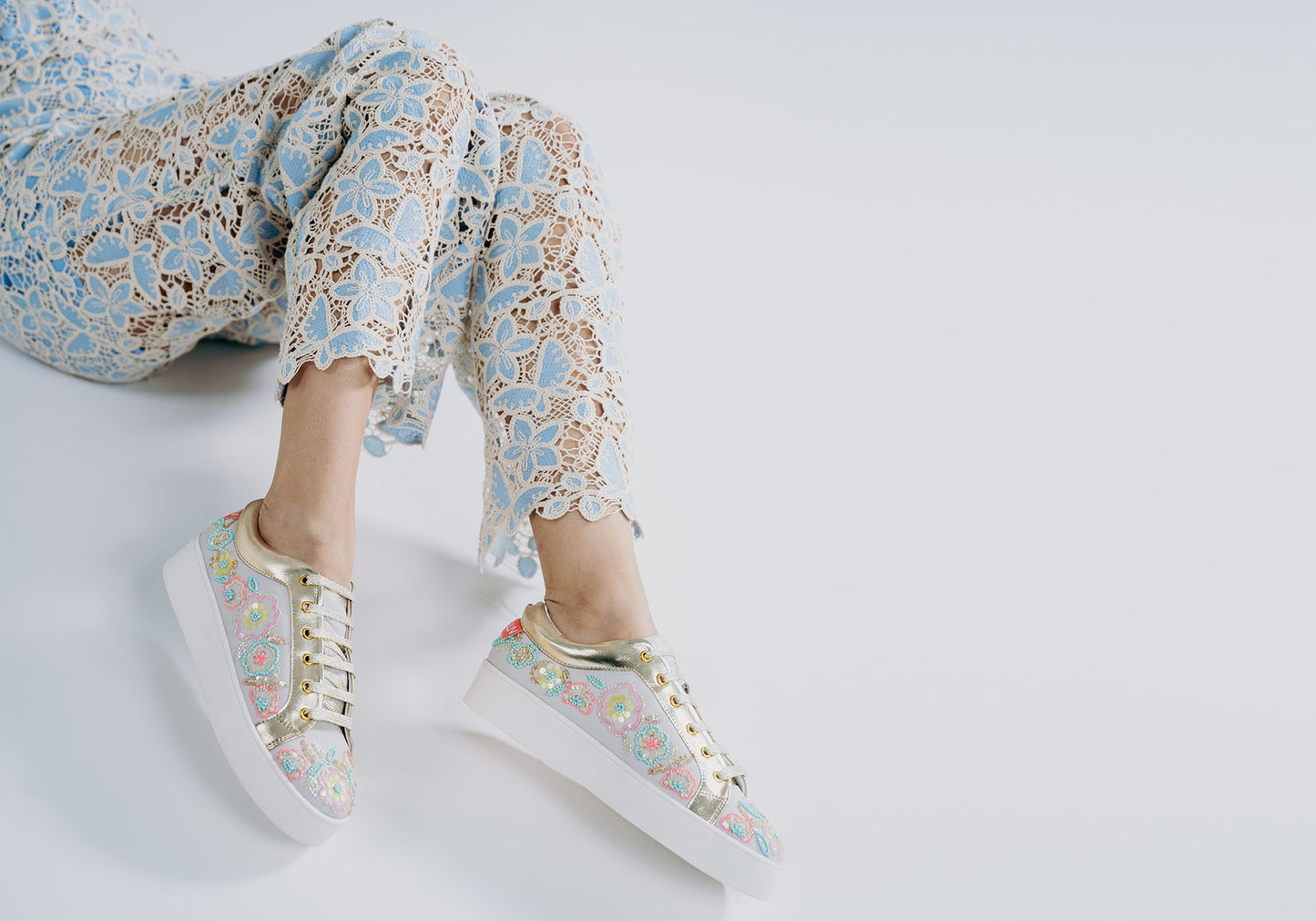 Thrive – White leather sneaker with vibrant multi-color embroidery