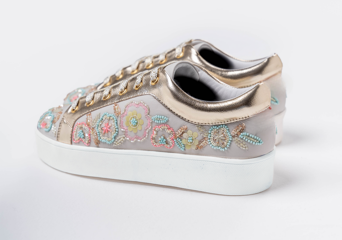 Thrive – White leather sneaker with vibrant multi-color embroidery