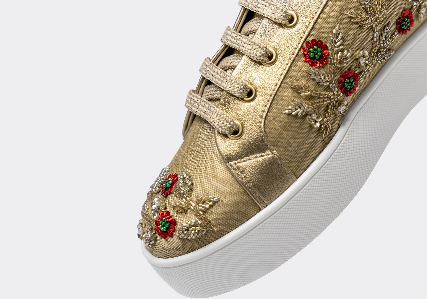 Blaze – Gold tissue fabric with gold and red flower embroidery